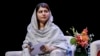 Nobel Peace Prize laureate Malala Yousafzai sits onstage after delivering the 21st Nelson Mandela Annual Lecture in Johannesburg on December 5.