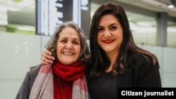 Nahid Taghavi poses with with her daughter, Mariam Caren, after her release on January 12.