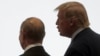 Russian President Vladimir Putin (left) and U.S. President Donald Trump walk together during a G20 leaders summit in Japan in 2019. 