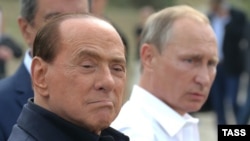 Russian President Vladimir Putin (right) and Italian former Prime Minister Silvio Berlusconi visit archaeological excavations outside Sevastopol, Crimea, on September 12.