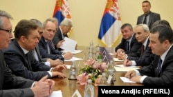 Serbian Prime Minister Ivica Dacic (right) meets with Aleksei Miller of Gasprom in Belgrade on November 11.